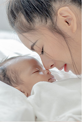 Mother Kissing Baby